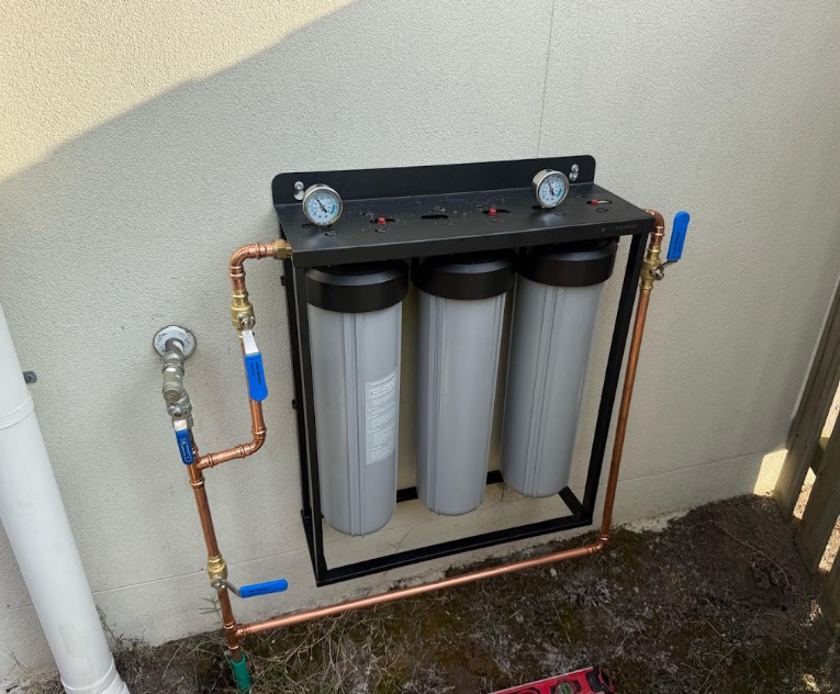 Comparison of a whole house water filtration system and an under-sink water filter